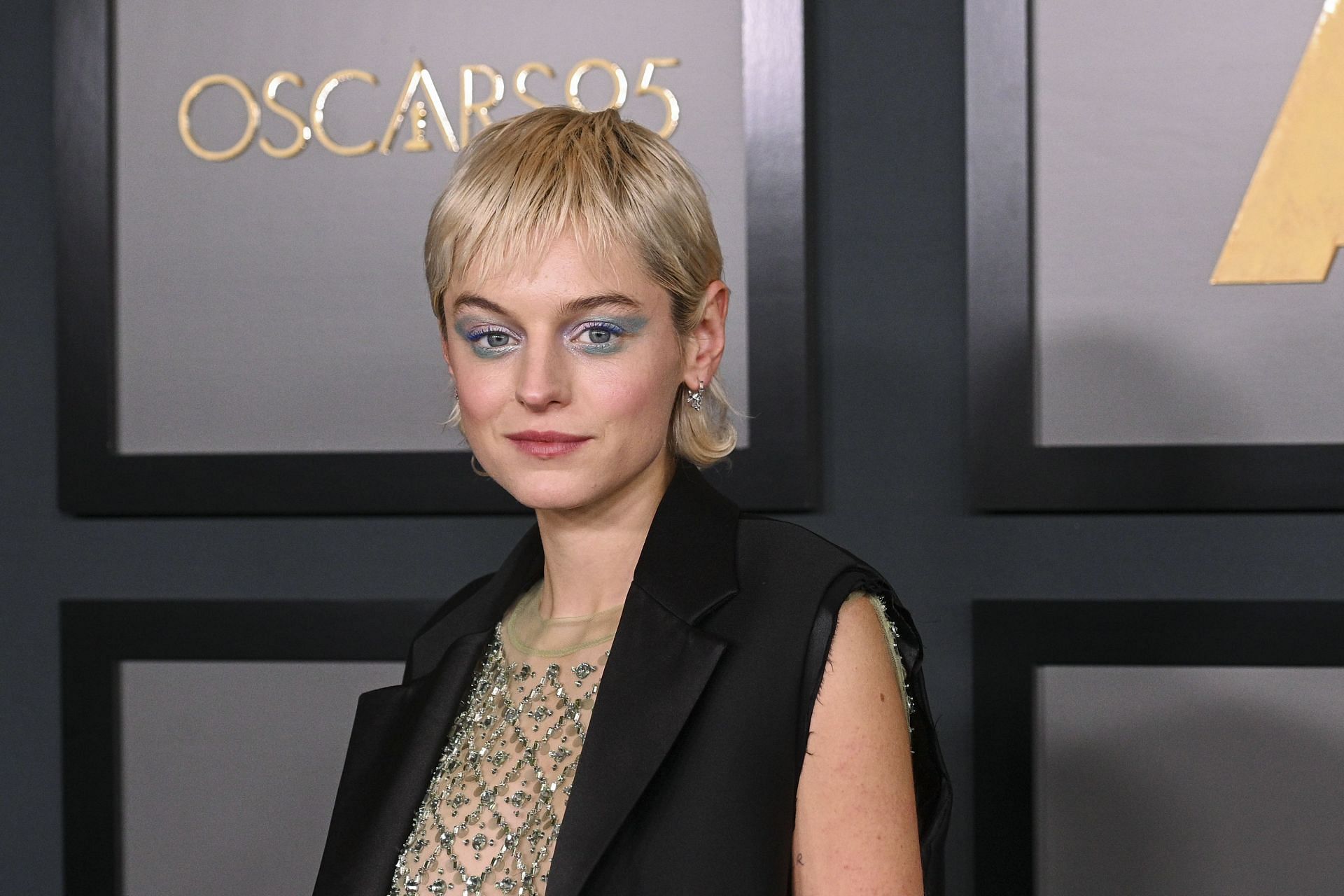 Emma Corrin has been announced as the lead villain in Deadpool 3, but her character's identity remains a mystery (Image via Getty)